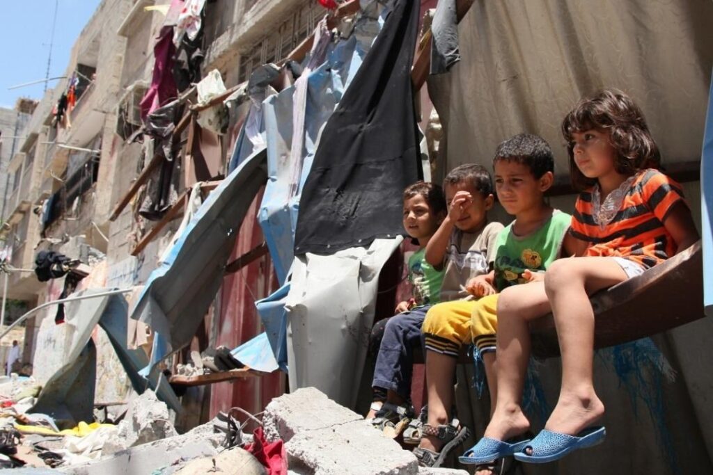Children in Rafah, Gaza, living in damaged shelters, under siege from Israeli forces