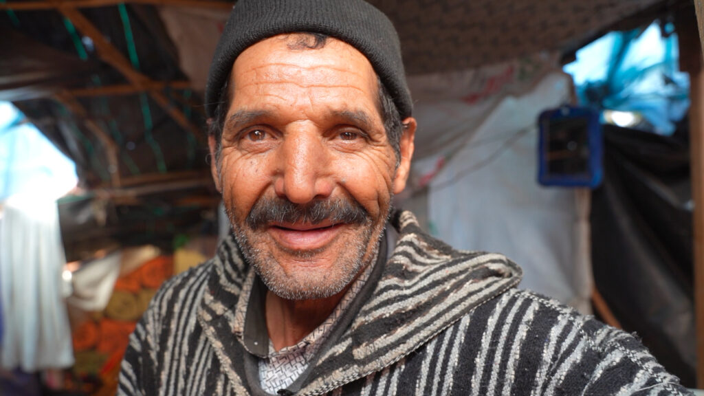 After the earthquake destroyed Hamid’s house, he was forced to live in makeshift tents that he repaired himself