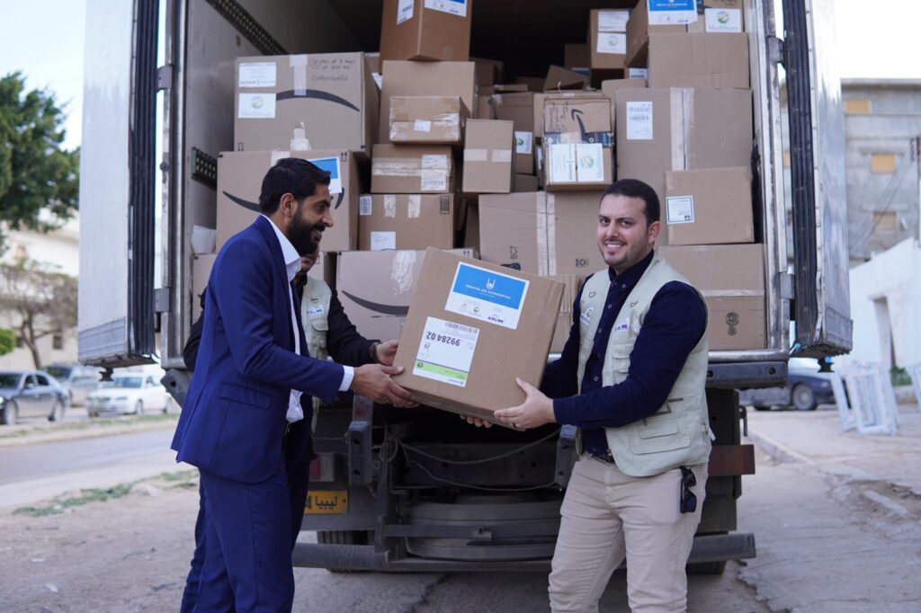 Islamic Relief and a local partner workers delivering medical aid to Wihda hospital in Derna, Libya