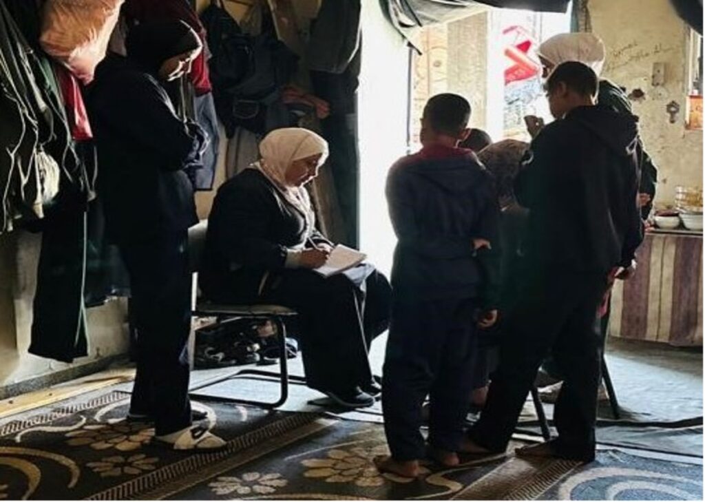 Neda'a and her family under shelter (Gaza) 