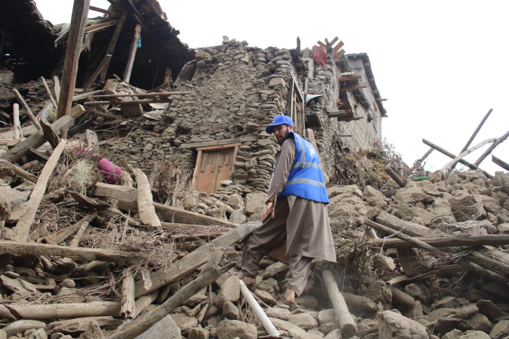 Islamic Relief staff survey the damage from a powerful 2025 earthquake in Afghanistan’s Kunar province