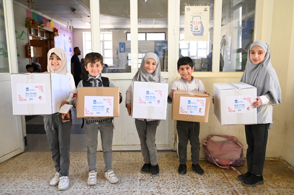 Kids receiving eid al fitr gifts