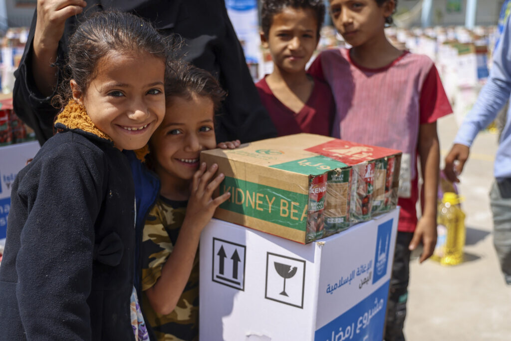 Children in need in Yemen receiving a food pack for Ramadan and to receive one for Zakat al-Fitr (Zakat ul-Fitr)