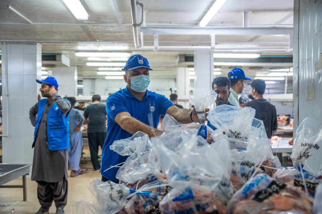 islamic relief team on the ground in pakistan for distribution of Qurban meat 
