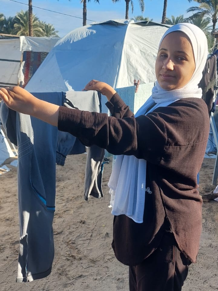 Heba, Yasmeen's mother. Her daughter is one of the many children struggling with mental health in Gaza. 