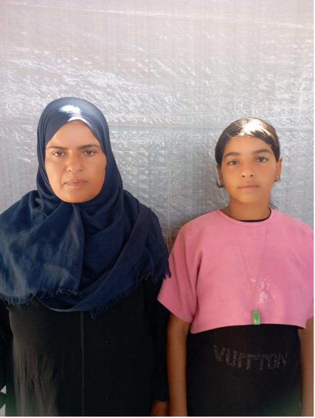 Amira and her mother in Gaza, recipients of the Orphan Sponsorship Program